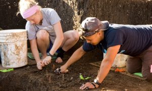 two students troweling