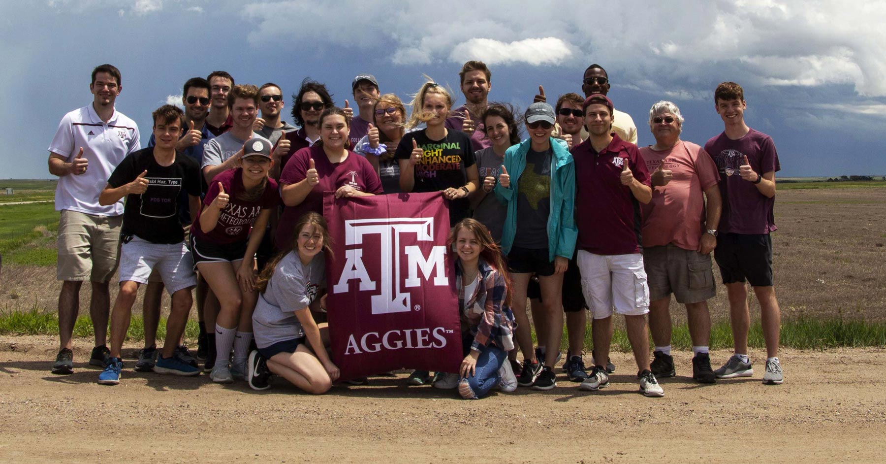 Students posing for a group photo during the convective storms field study