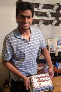 Jibran with congratulations cake