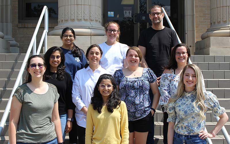 The Biology Graduate Students’ Association smiles while posing for a group photo.