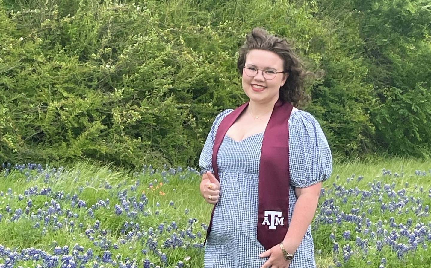 Samantha "Sami" Schramm in a field of bluebonnets