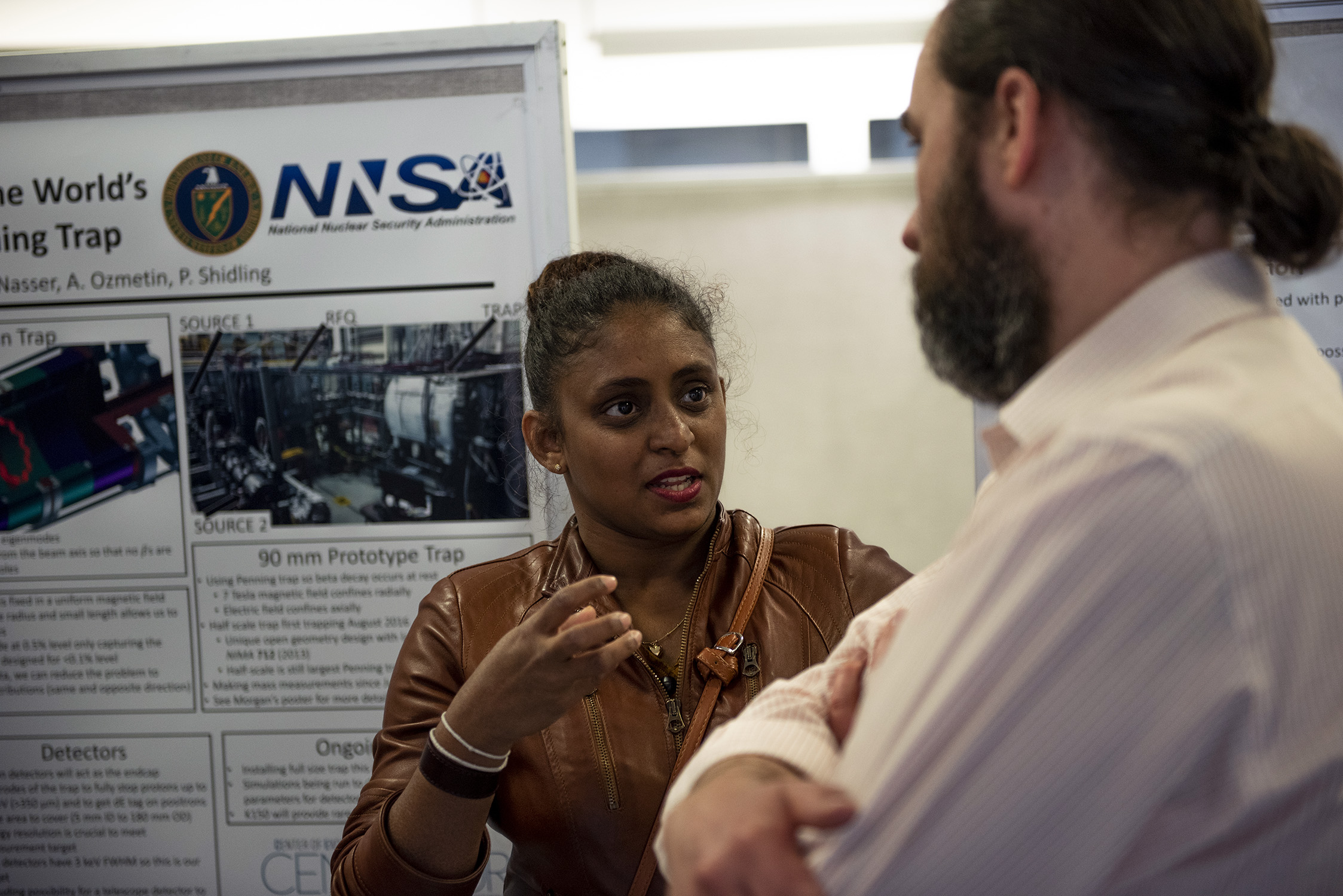 A female graduate student presents her research to a faculty mentor at Texas A&amp;M University