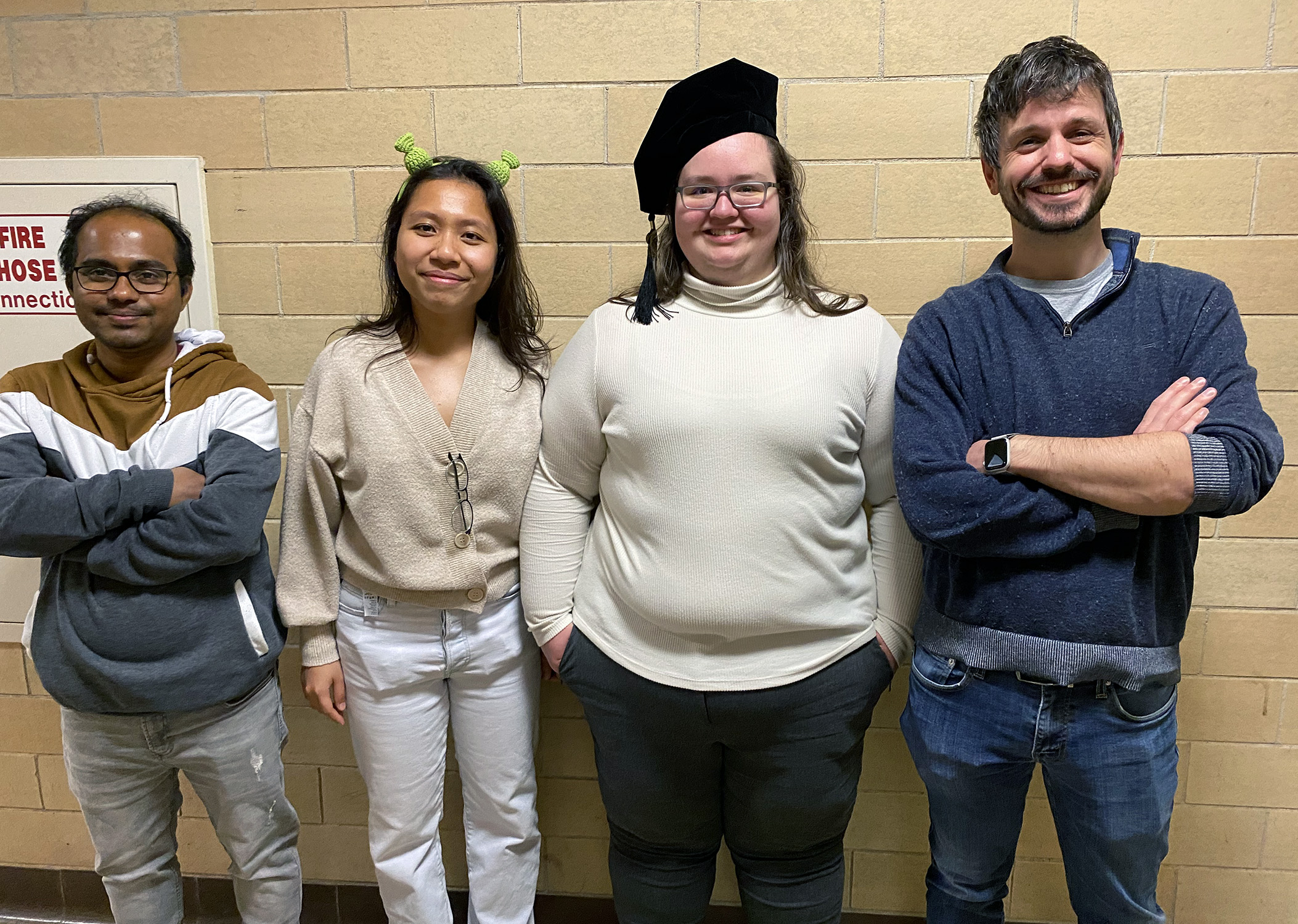 Texas A&amp;M University chemist Quentin Michaudel (right), pictured with Michaudel Laboratory members (from left) Arunava Maity, An Tran and Sarah Hancock at Hancock's doctoral commencement on Dec. 15, 2023