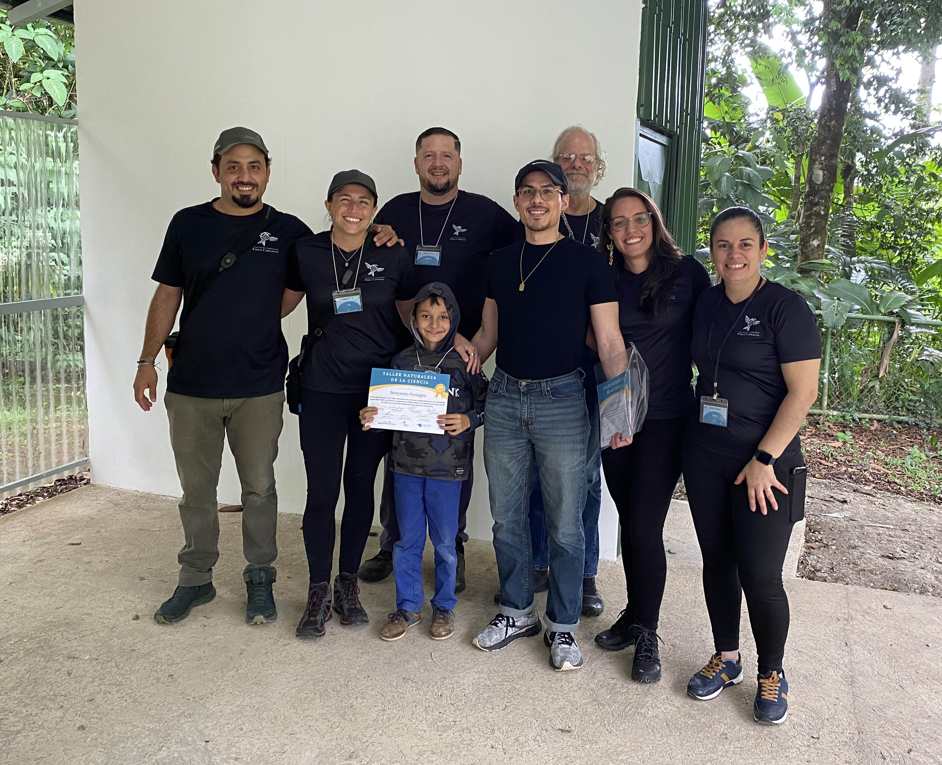 Texas A&amp;M University doctoral student Daniel De Jesús (center in blue jeans) poses with a group of Finca Cántaros Environmental Association staff during his 2023 visit to Costa Rica