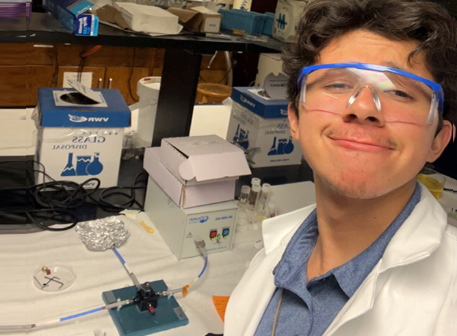 Texas A&amp;M University chemical engineering major Juan Guio, working in a research laboratory within the Chemistry Building