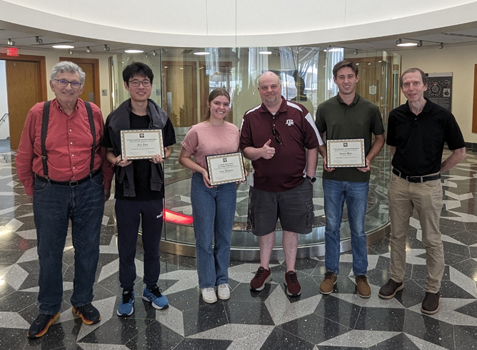 Group photograph of the top three performers in the Spring 2024 Mechanics Scholars Challenge Exam, pictured alongside their instructors in the course