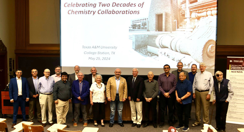 Group photograph of chemistry faculty and administrators from Texas A&M University and Texas A&M University at Qatar taken in Martell Lecture Hall on the Texas A&M University campus on May 25, 2024