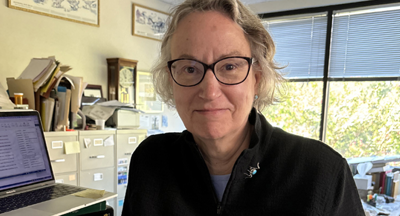 Texas A&M University geologist Anne Raymond sits at her desk within her office in the Halbouty Building on the Texas A&M campus