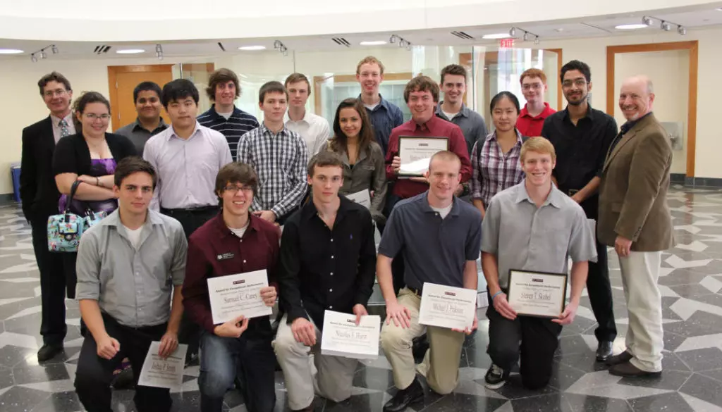 Spring 2012 Addison Wesley/Benjamin Cummings Mechanics Scholars, flanked by Texas A&M physicists Dr. George Welch (back row, far left) and Dr. David Toback (back row, far right).